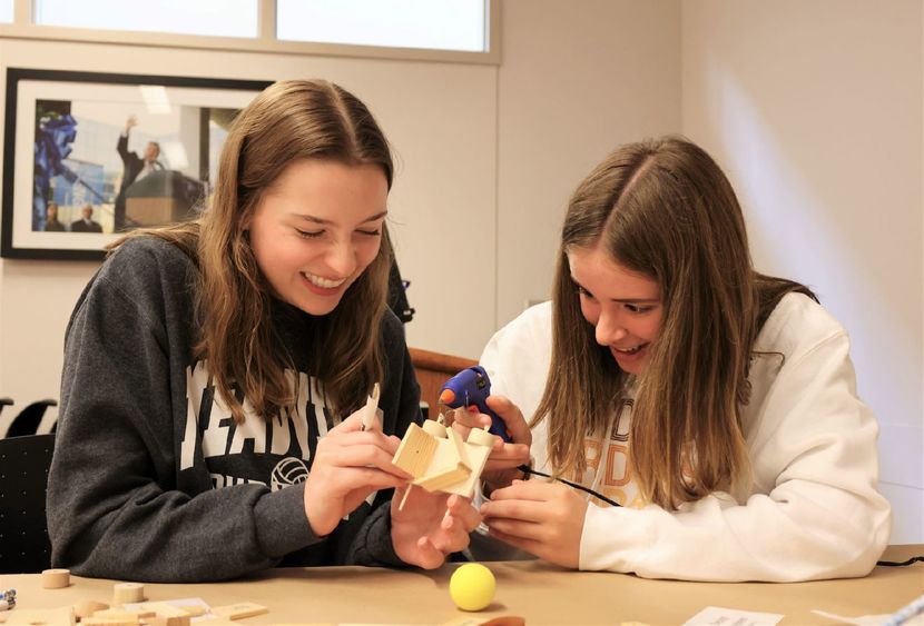 Two high school students complete an engineering task during Penn State Behrend's Women in Engineering day program.