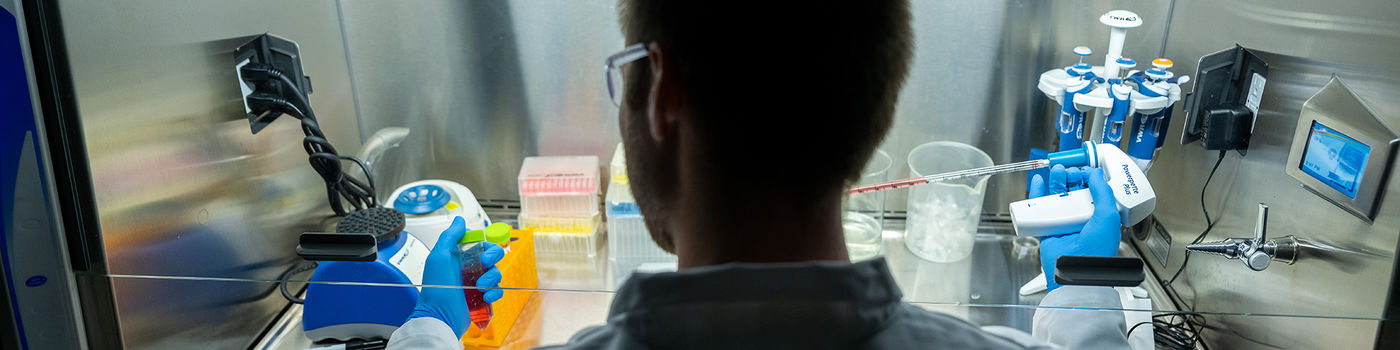 A researcher conducting tests in a Behrend research lab.