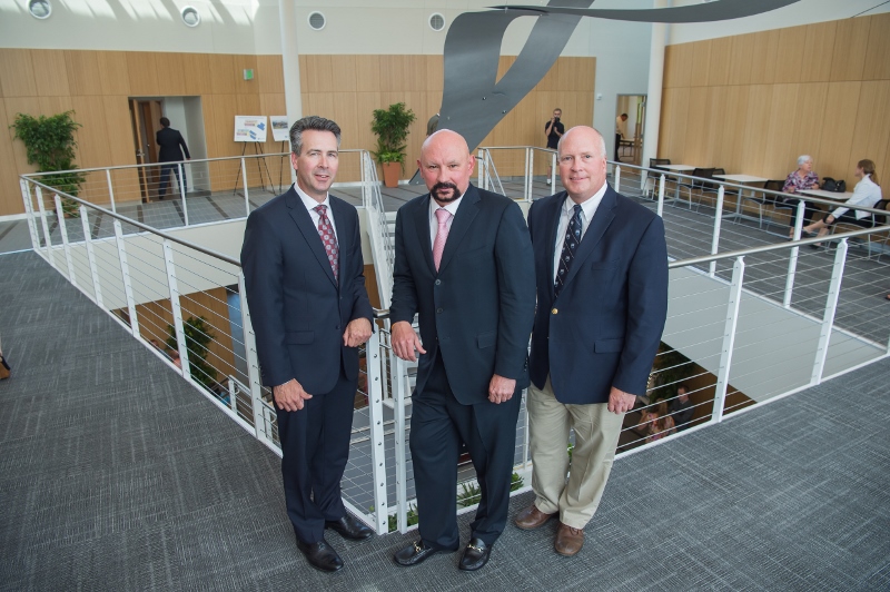 Speakers pose at the opening of the Advanced Manufacturing and Innovation Center.