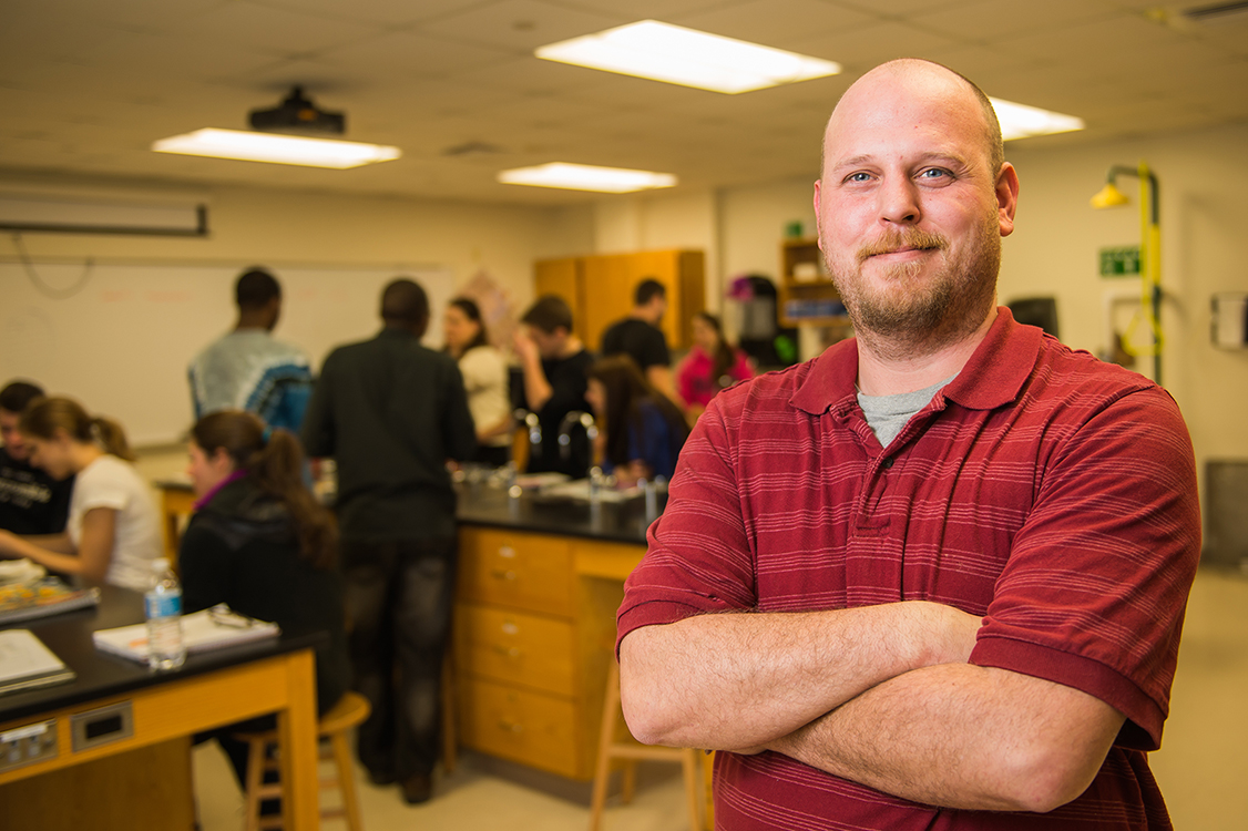 Adult student in microbiology lab