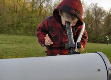 Boy with telescope at Astronomy Open House