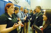 Employers talk with students at the Penn State Behrend Career and Internship Fair