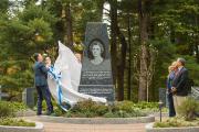 A cover is pulled off the Mary Behrend monument